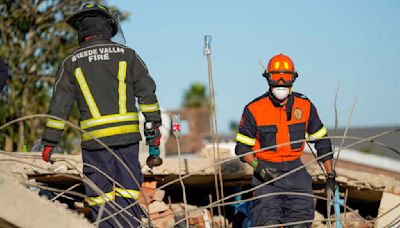 Hope fades for dozens missing days after South Africa building collapse as death toll rises to 12