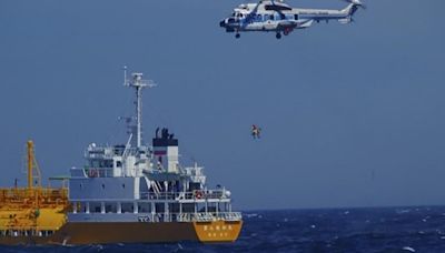 Woman swept to sea while swimming at a Japanese beach rescued 37 hours later and 50 miles away