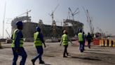 One year on from World Cup, Qatar and FIFA urged by rights group to do more for migrant workers