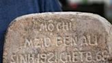 The tombstone of Mzid Ben Ali is the last reminder of a man whose past in Vietnam has been largely forgotten