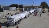 Aid trucks begin entering Gaza from southern Israel