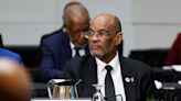 Haiti PM Henry steps down as transitional government takes power