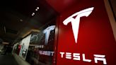 Tesla's price cuts drag share prices sharply lower