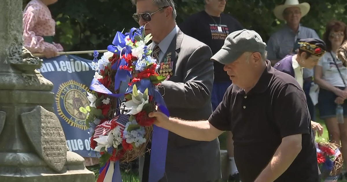 Community members gather at Laurel Hill Cemetery in Philadelphia to honor veterans who made the ultimate sacrifice