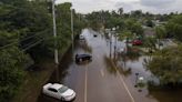 How many homes and cars were damaged in South Florida floods? Take a look.