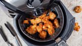 The Biggest Downside To Cooking With An Air Fryer (And Why It's Not A Big Deal)