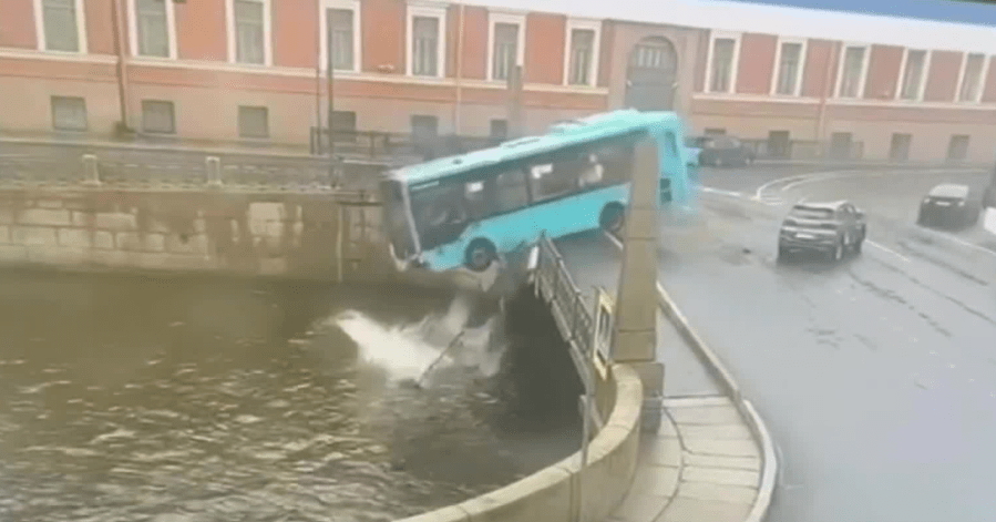 Video: Passenger bus drives over bridge, into river in Russia