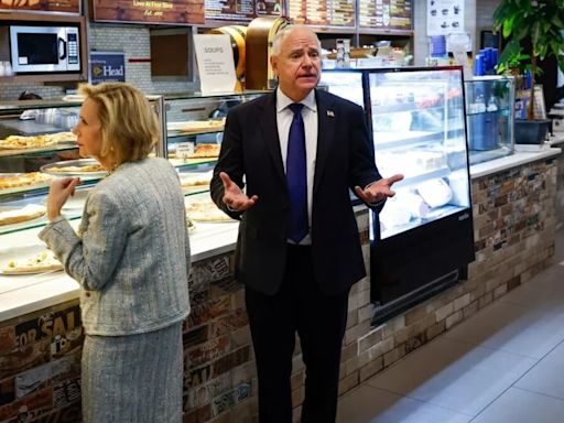 Tim Walz, wife Gwen celebrate ‘great night’ with pizza slice after Harris campaign claims win following heated VP debate