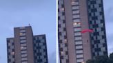 Base jumper leaps from Millbrook Towers in shock video