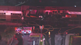 Firefighters tackle fire at dry cleaners in Garden Grove; roof partially collapsed