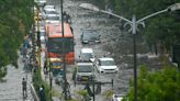 Eleven killed in India as record rainfall causes travel disruption