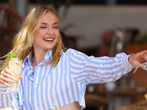 Sophie Turner sips on cocktails during al fresco lunch in France