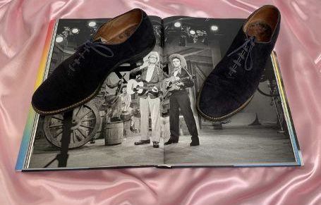 Elvis Presley's blue suede shoes sell at auction