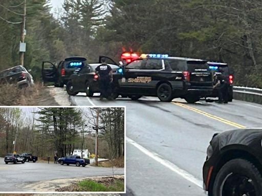 Moment Maine cops unleash hail of bullets at gunman in hospital gown who tried to steal cruiser