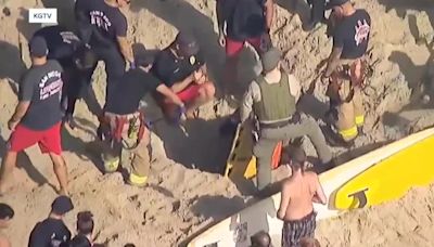 Teen nearly buried herself alive in hole on the beach