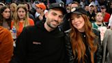 Lindsay Lohan and Husband Bader Shammas Smile as They Sit Courtside at New York Knicks Game