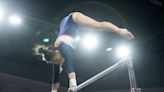 Suni Lee logs a 9.95 on bars as Auburn gymnastics tops NC State in Neville Arena