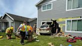 2 in critical condition after car hits bystander, crashes into apartment in Longview