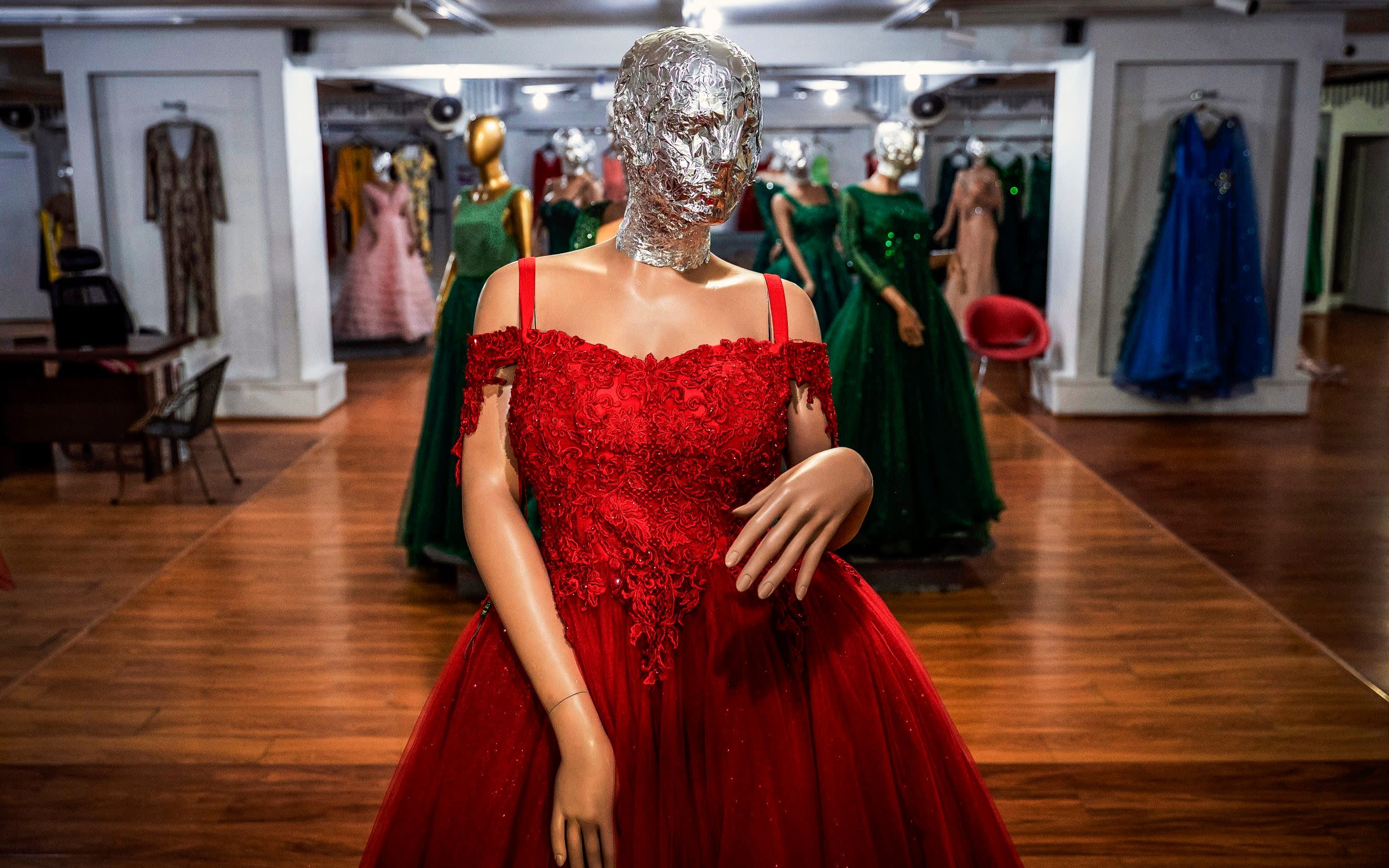 Kabul clothes shops ordered to cover mannequin faces by Taliban