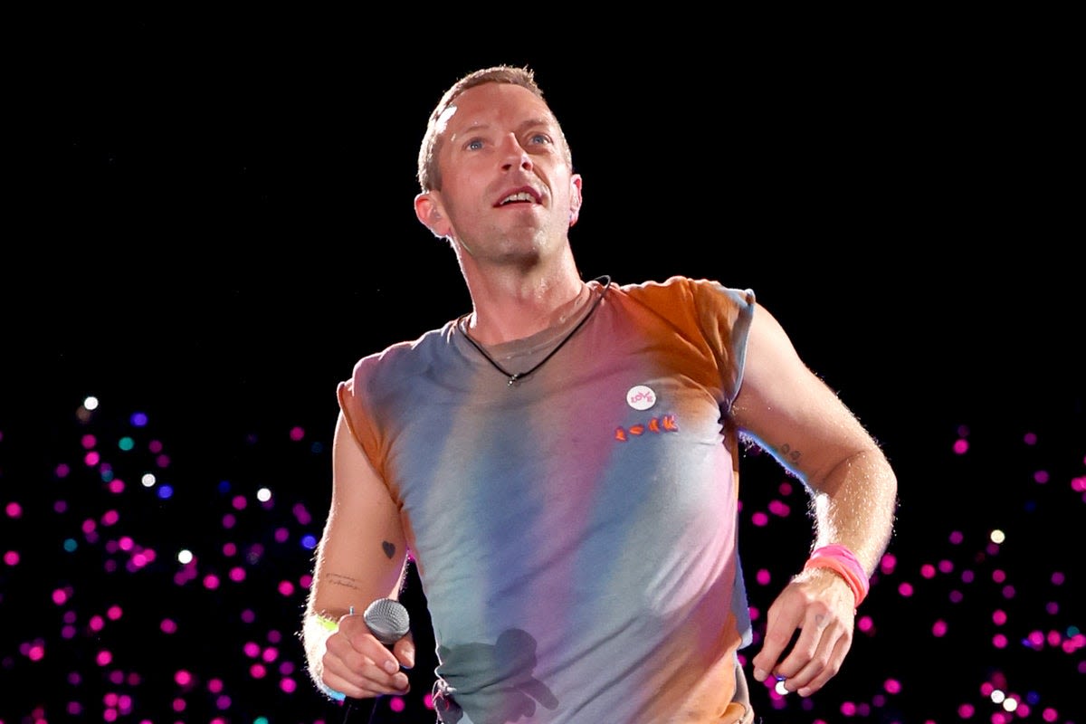 Chris Martin halts Coldplay gig after Israeli flag-wearing 'comedian' falls while attempting to storm stage