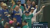 A fan at a Kansas City Royals game caught two foul balls on consecutive pitches