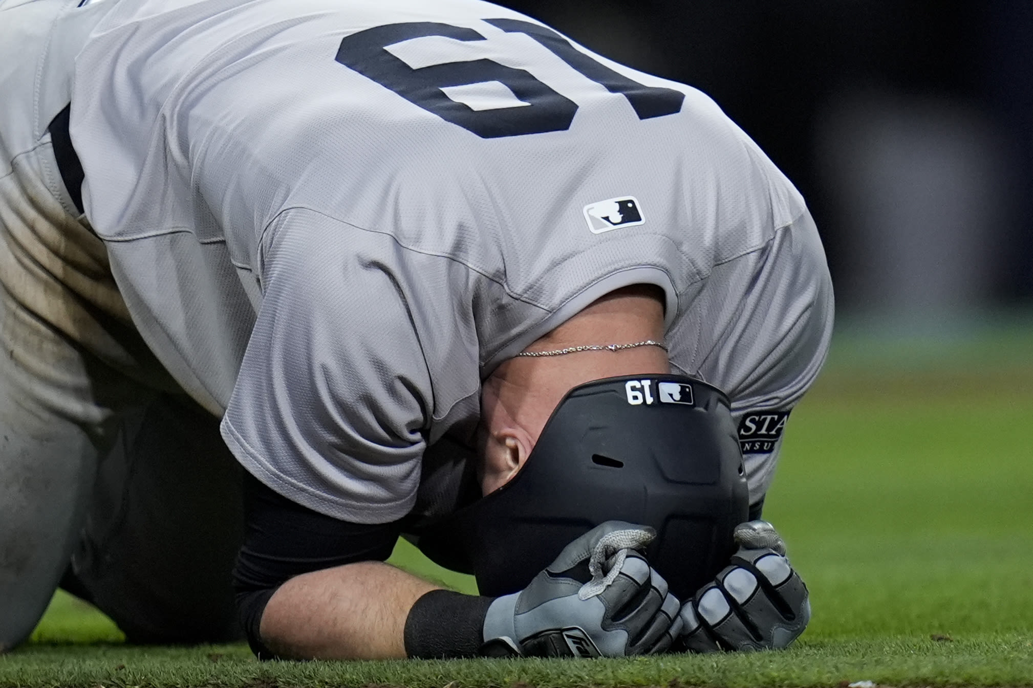 Yankees place Berti on the injured list with a left calf strain and select Smith from Triple-A