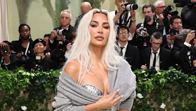 Kim Kardashian doesn't care what you think. She'll keep wearing extreme corsets to the Met Gala.