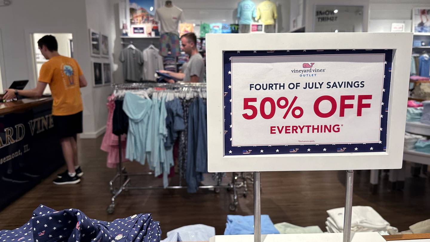 Retail sales unchanged in June from May, underscoring shoppers' resilience