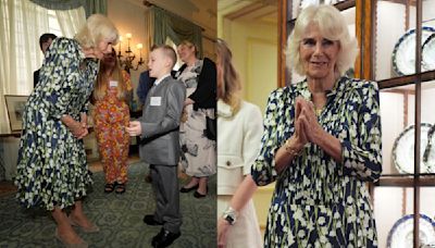 Queen Camilla Favors Fiona Clare Midi Dress With Romantic Floral Prints at National Literacy Trust Celebration