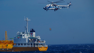 Woman rescued 37 hours after being swept out to sea from Japanese beach, found 50 miles away