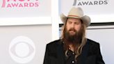 Chris Stapleton shocked to hear Dolly Parton named him her 'favourite' duet partner on star-studded rock album