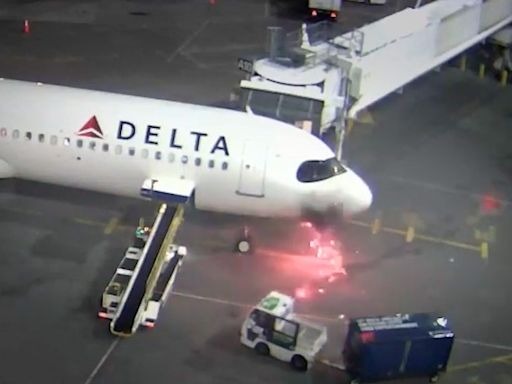 Watch: Passengers evacuate a Delta jet in Seattle after fire breaks out