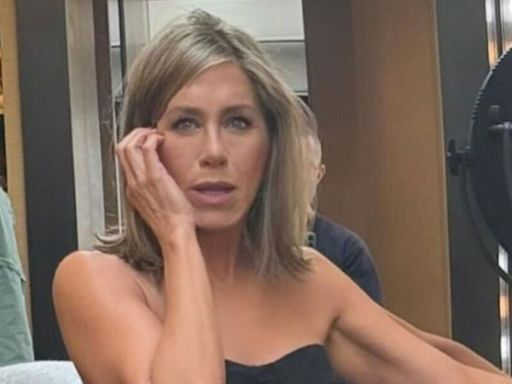 Jennifer Aniston looks younger than ever in plunging dress for very rare selfie