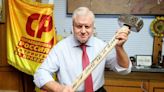 Russian politician poses with sledgehammer in tribute to Wagner mercenaries