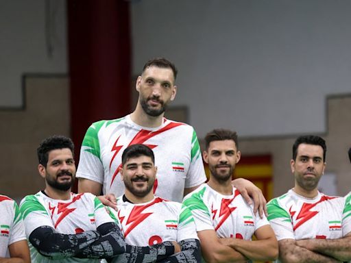 Not-so-secret weapon: world’s second-tallest man leads Iran into sitting volleyball final