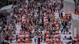 Paris' traffic-clogged Champs-Elysees turned into a mass picnic blanket for an unusual meal