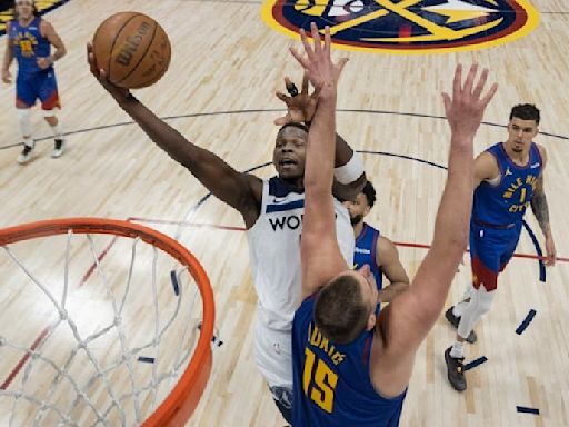 Edwards is brightest star as Wolves beat Denver in Game 1