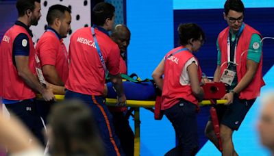 Slovakia swimmer collapses after race at the Olympics and had to be removed on stretcher