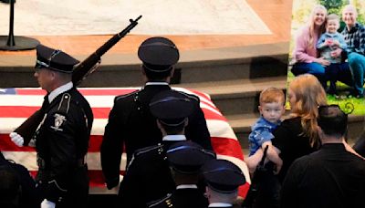 Slain Charlotte officer remembered as hard-charging cop with soft heart for his family