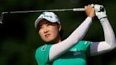 Minjee Lee of Australia plays a tee shot on the way to a share of the third-round lead in the US Women's Open