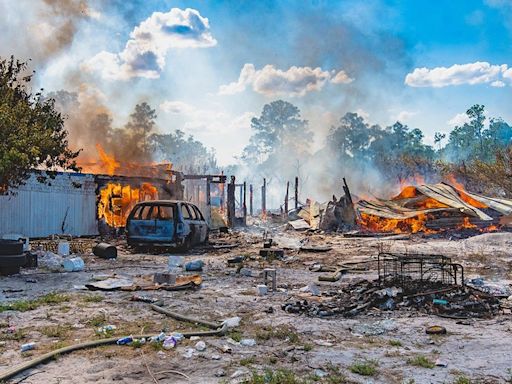 Fires burn hundreds of acres in Polk as firefighters from around the state rush to help