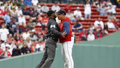 Red Sox manager Alex Cora needed to be restrained during ejection vs. Twins