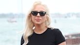 Lady Gaga poses with Joaquin Phoenix at Joker photocall in Venice