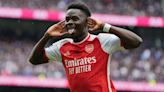 Arsenal withstand Tottenham’s second-half fightback to boost title hopes