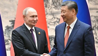 China's Xi Tells Putin Ready To 'Expand' Ties: State Media