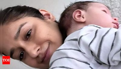 Ileana D’Cruz melts hearts with baby Koa, explains the science behind hugging a child | Hindi Movie News - Times of India