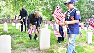 Former President Obama surprises volunteers at Memorial Day event