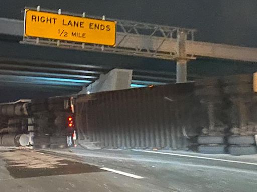 Northbound I-65 closed at the North Split due to semi rollover