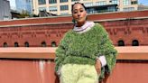 Tracee Ellis Ross Lets Loose in a Grassy Tinsel Sweater and Shaggy Yellow Shorts