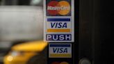 Visa, Mastercard lower swipe fees in settlement with merchants